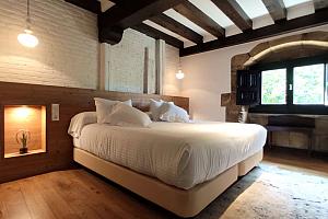 Attic room with big wooden beams